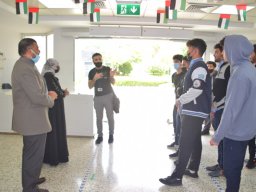 GR-12-Boys giving donation at Sharjah City for HumanitarianServices